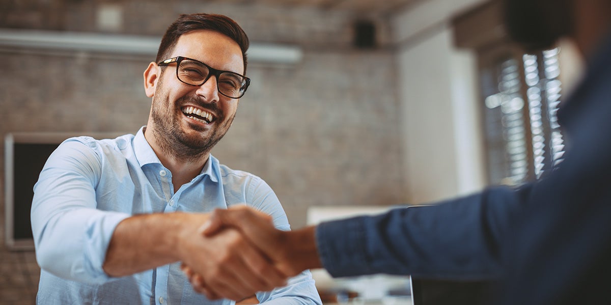 Family working with sales person